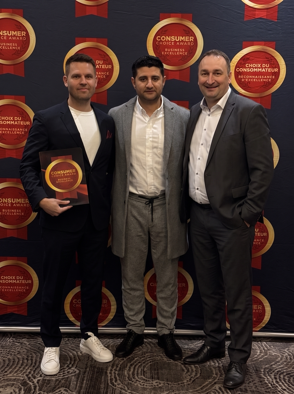 FiveStarJob founders receiving the Consumer Choice Award for Business Excellence